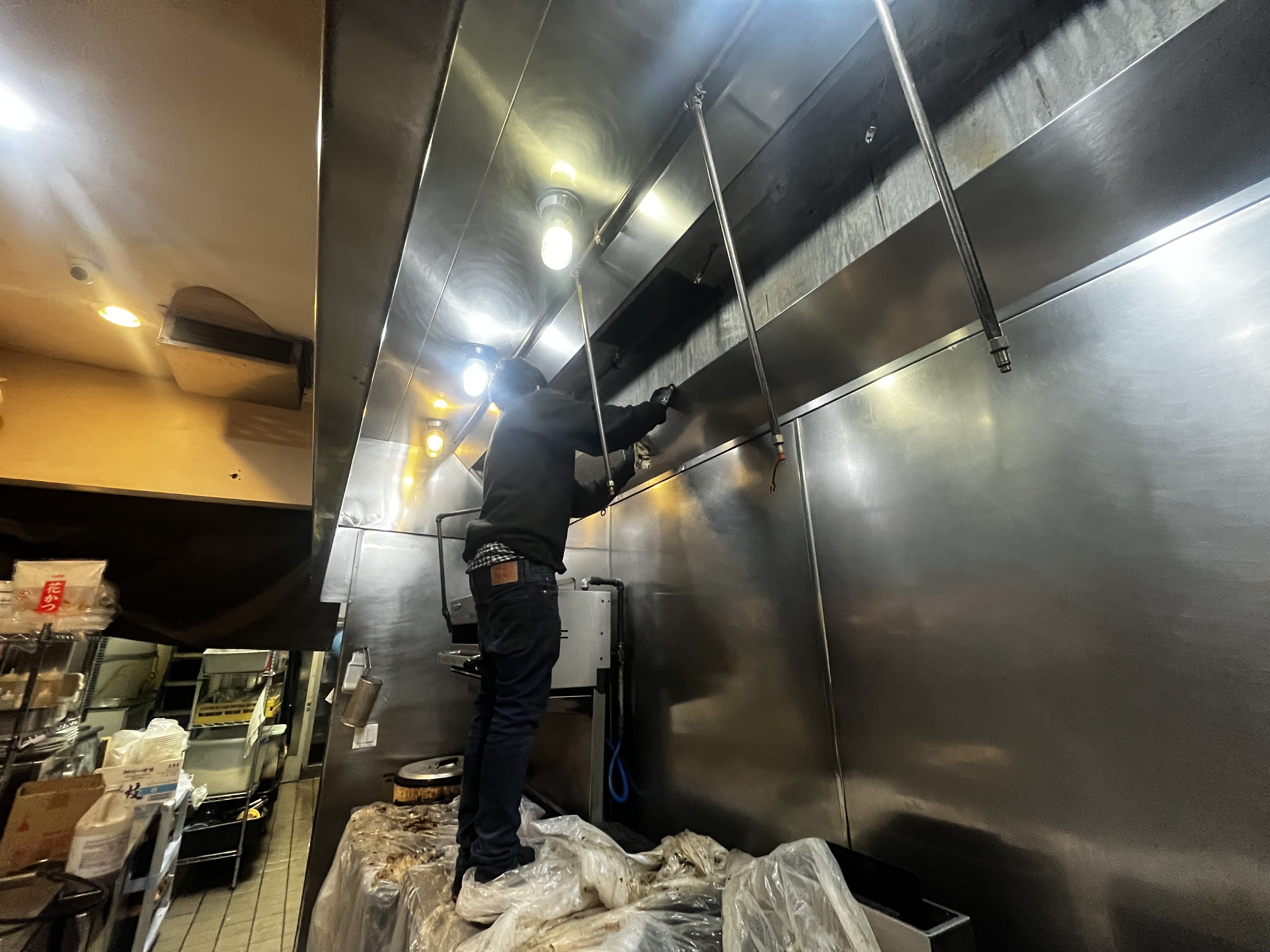 Professional hood cleaning in progress